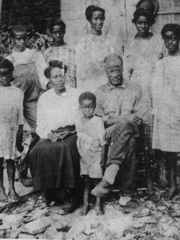 Front L to R Ina White, Hannah White, Noble White, William Charles White, BackRow Guster White, Dollie White, Claricy White, Mary White, Vera White Front L to R Ina White, Hannah White, Noble White, William Charles White, BackRow Guster White, Dollie White, Claricy White, Mary White, Vera White
